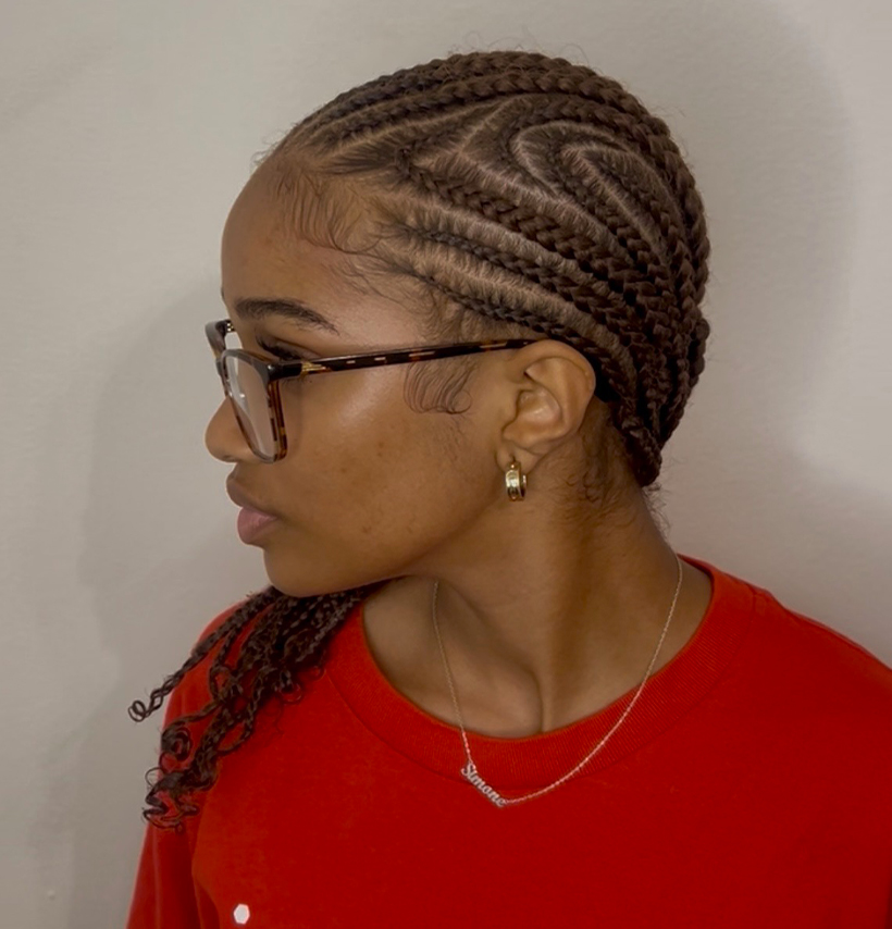 Intricate natural hair design by Crowned by Sisi